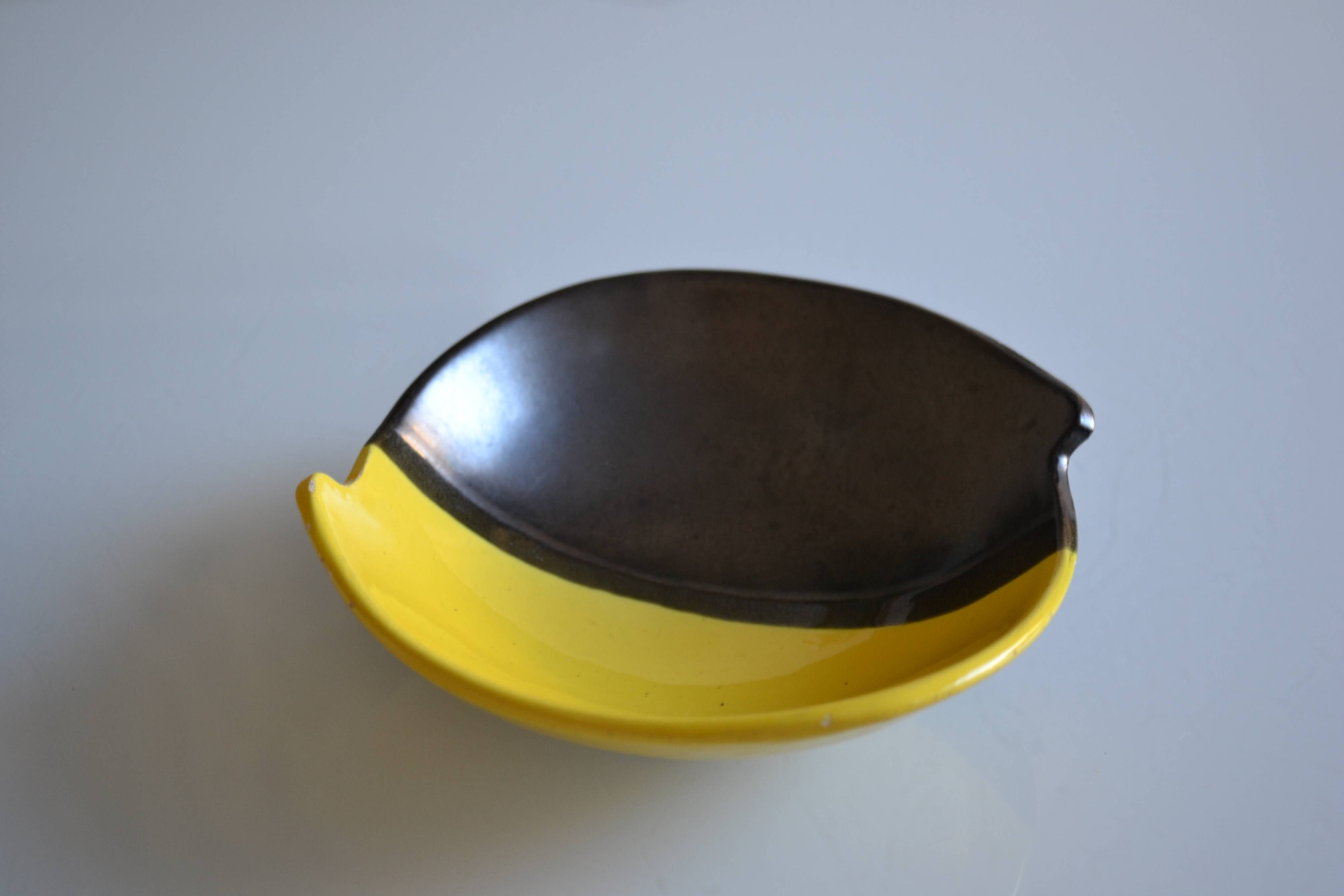 Bicolour ceramic cup in black and yellow signed Luc Vallauris 1950