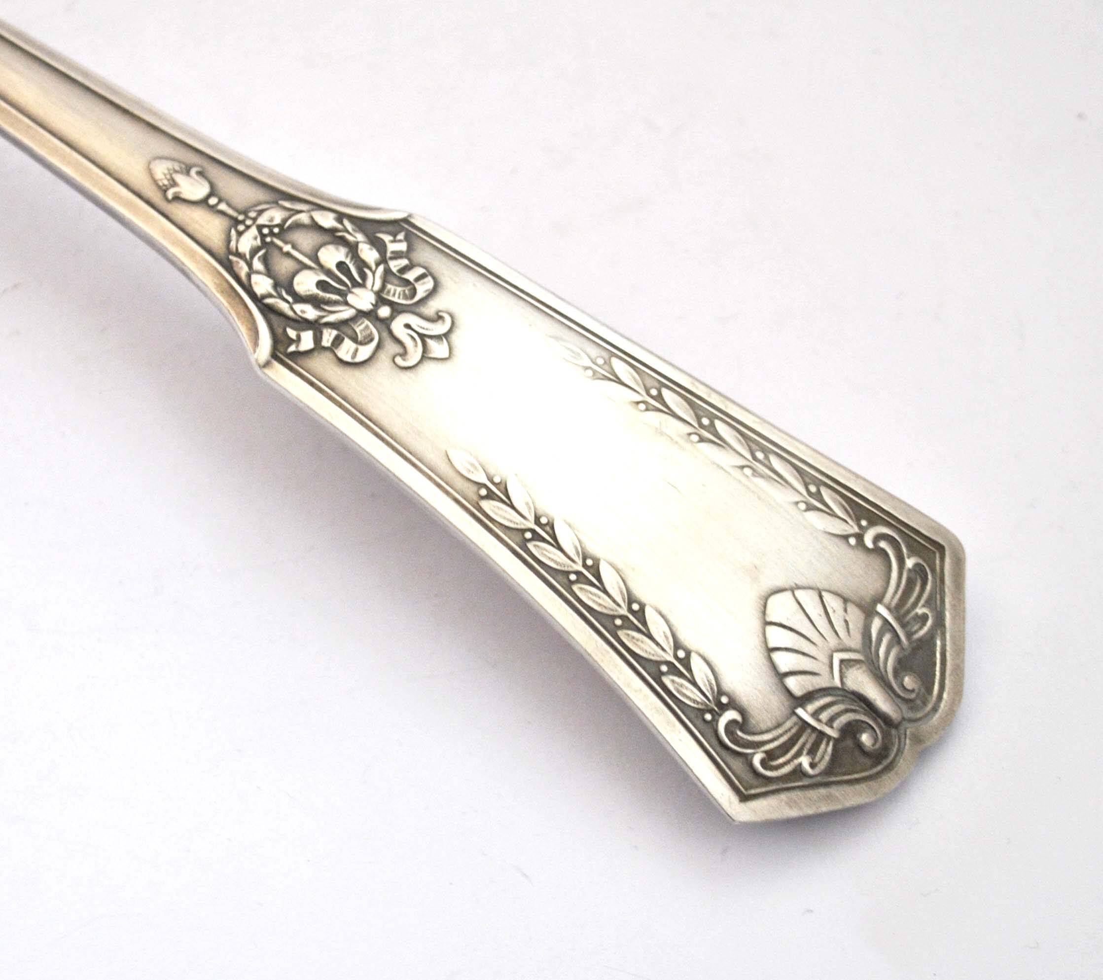 Empire ladle in silver metal SFAM - "Sans embarrass" model with winged shell laurel crown