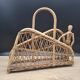Rattan magazine rack