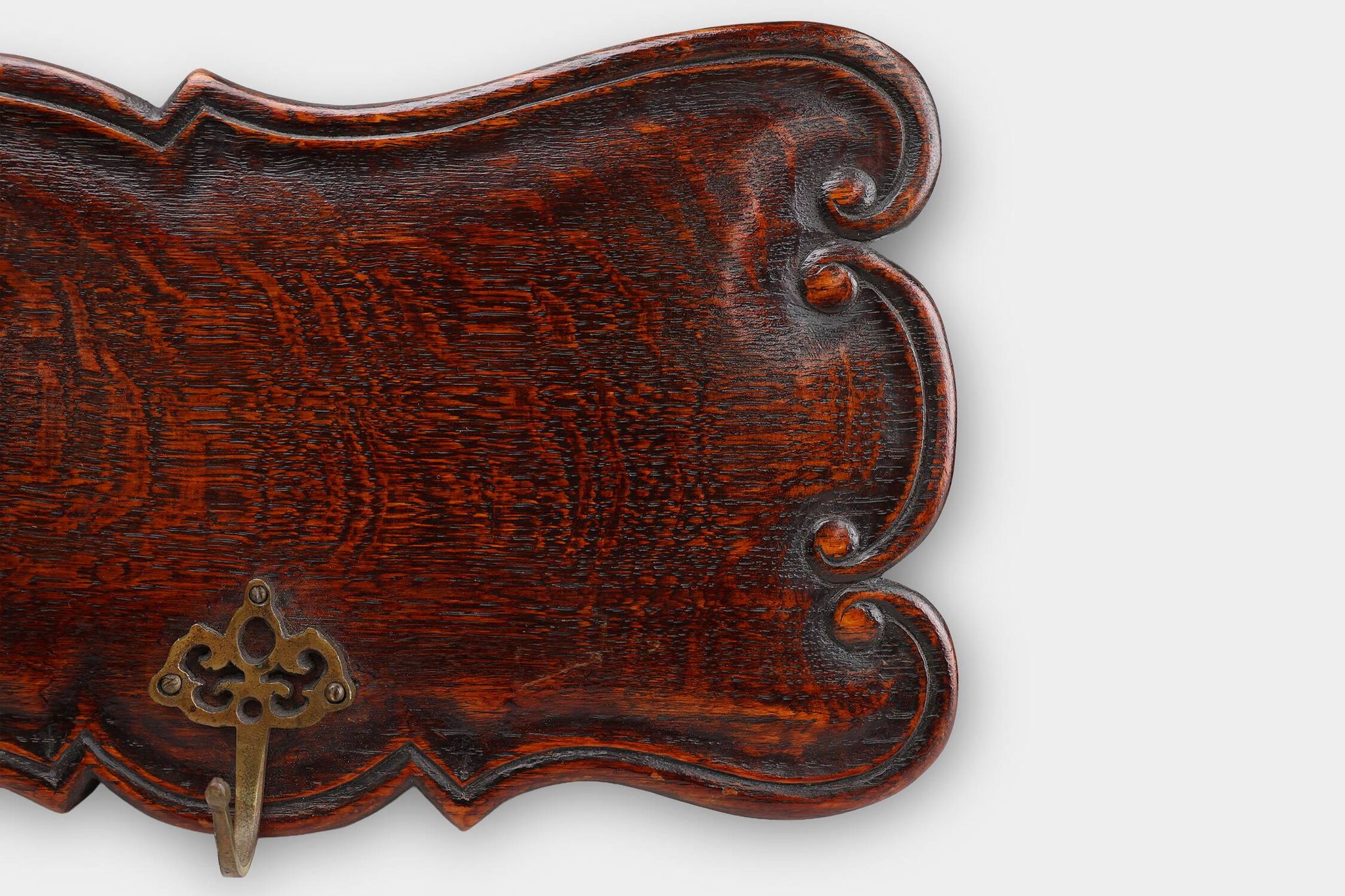 Art Nouveau style coat rack in oak with brass hooks, France ca. 1915
