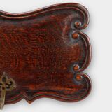 Art Nouveau style coat rack in oak with brass hooks, France ca. 1915