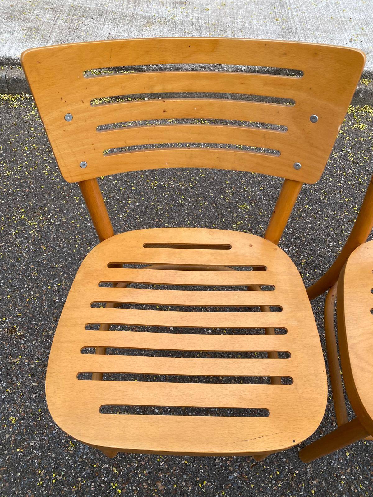 2 Scandinavian bistro chairs from Ikea, Balser, made of curved solid wood, 1999.