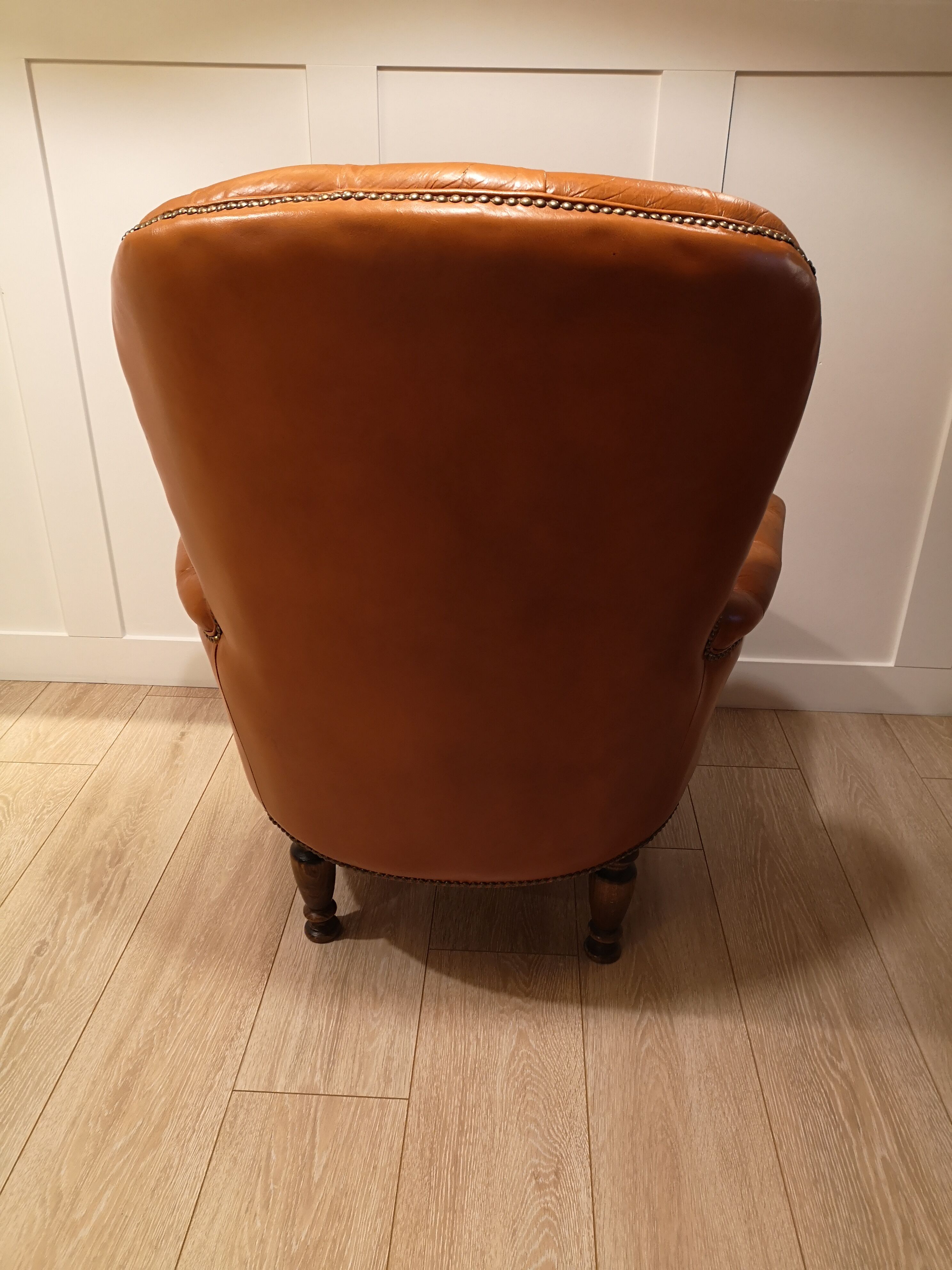 Pair of leather chesterfield chairs