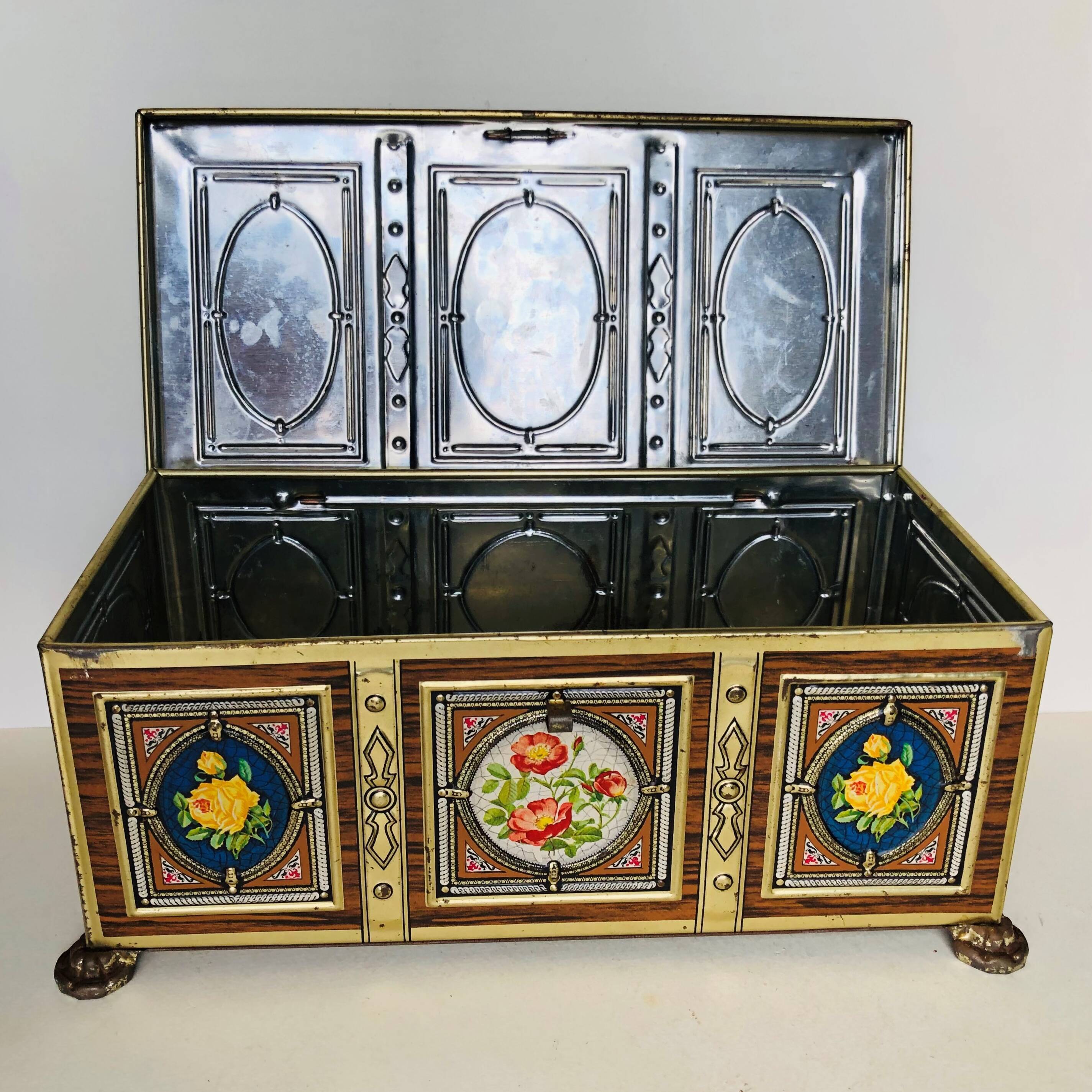 Old metal box decorated with flowers