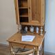 Former campaign secretary's desk in solid pine with a high cupboard.