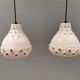Two ceramic hanging lamps, in creamy white color, looking almost like coral