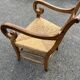 Louis Philippe country armchair in solid wood and straw, hooked armrests