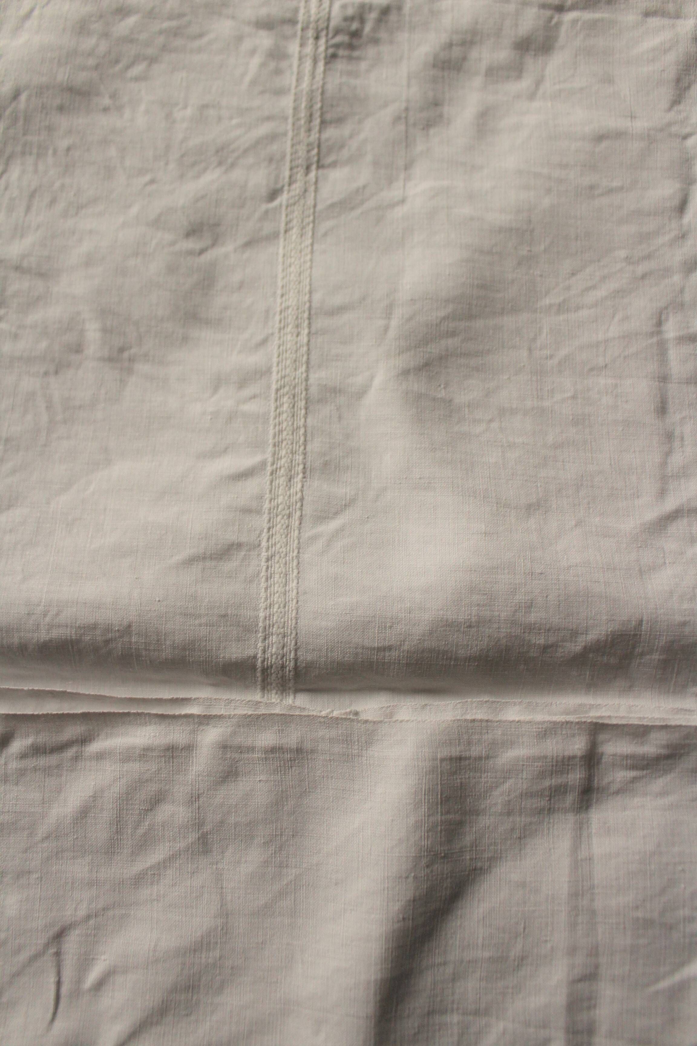 Un Lot de 2 serviettes de table lin blanc monogrammes G D