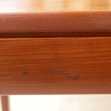 Expandable teak dining table