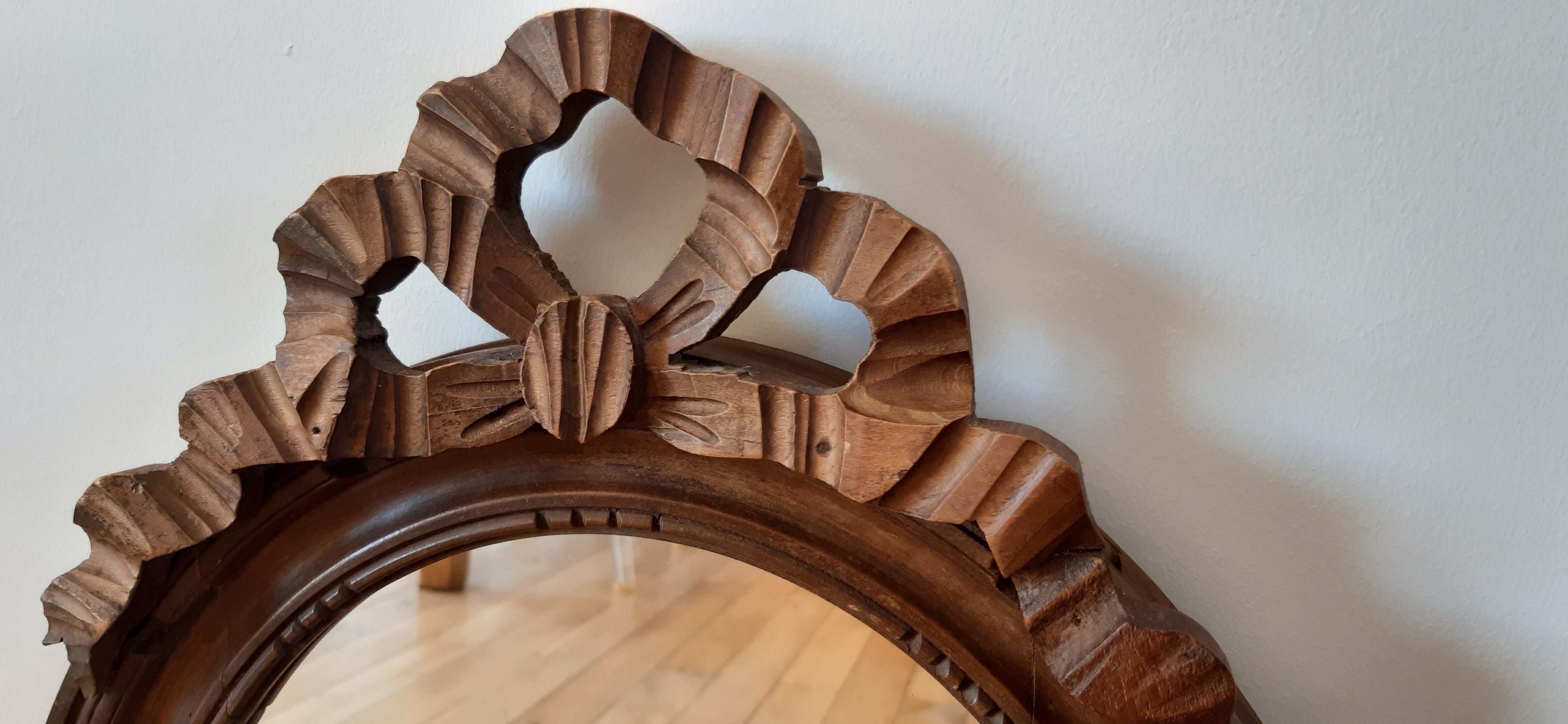 Miroir en bois oval années 30