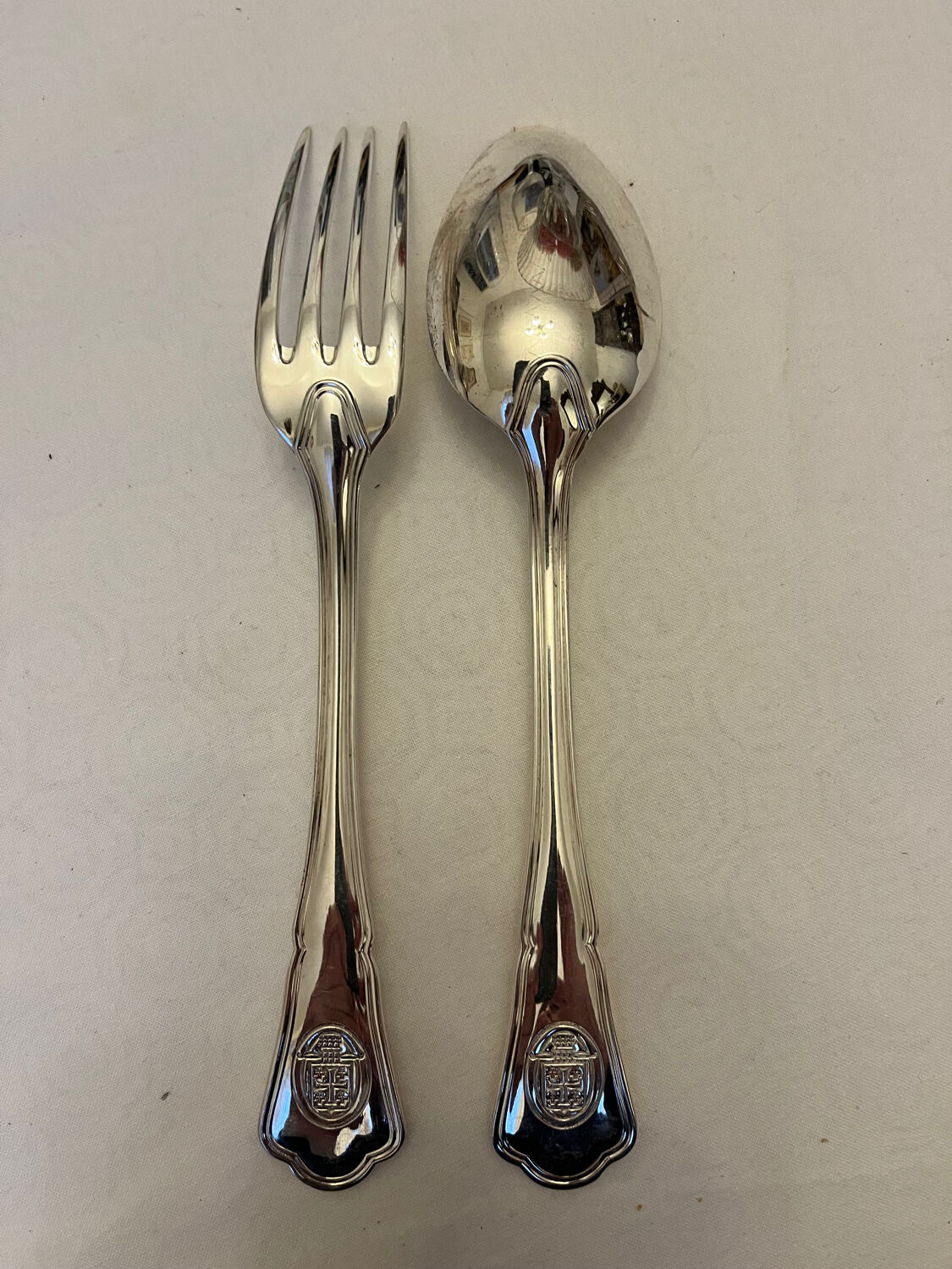 12 silver-plated cutlery sets by Ercuis