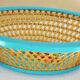 Antique basket in painted sheet metal and woven wicker, decorated with roses