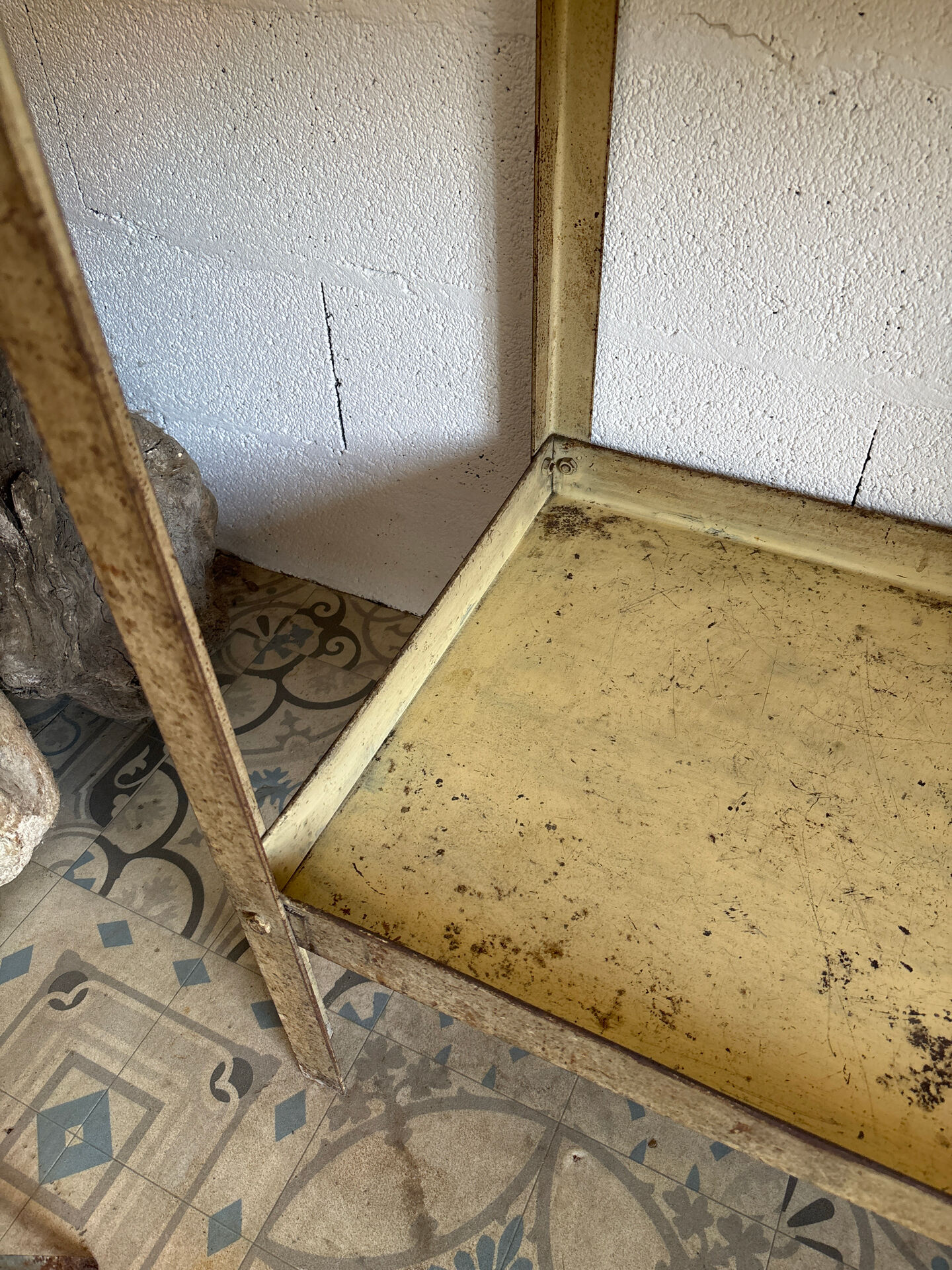 Beige metal shelf
