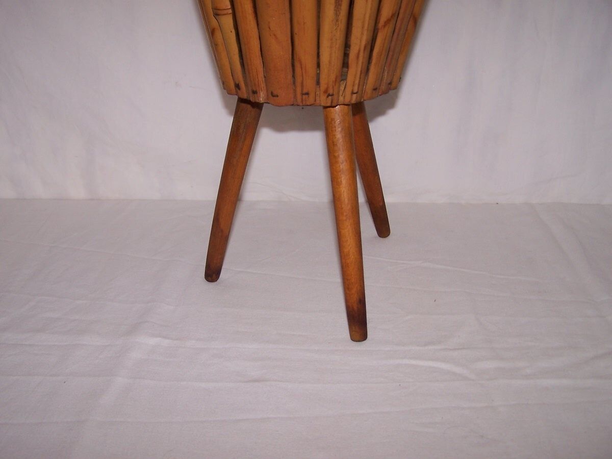 Rattan tripod planter of the 1950s