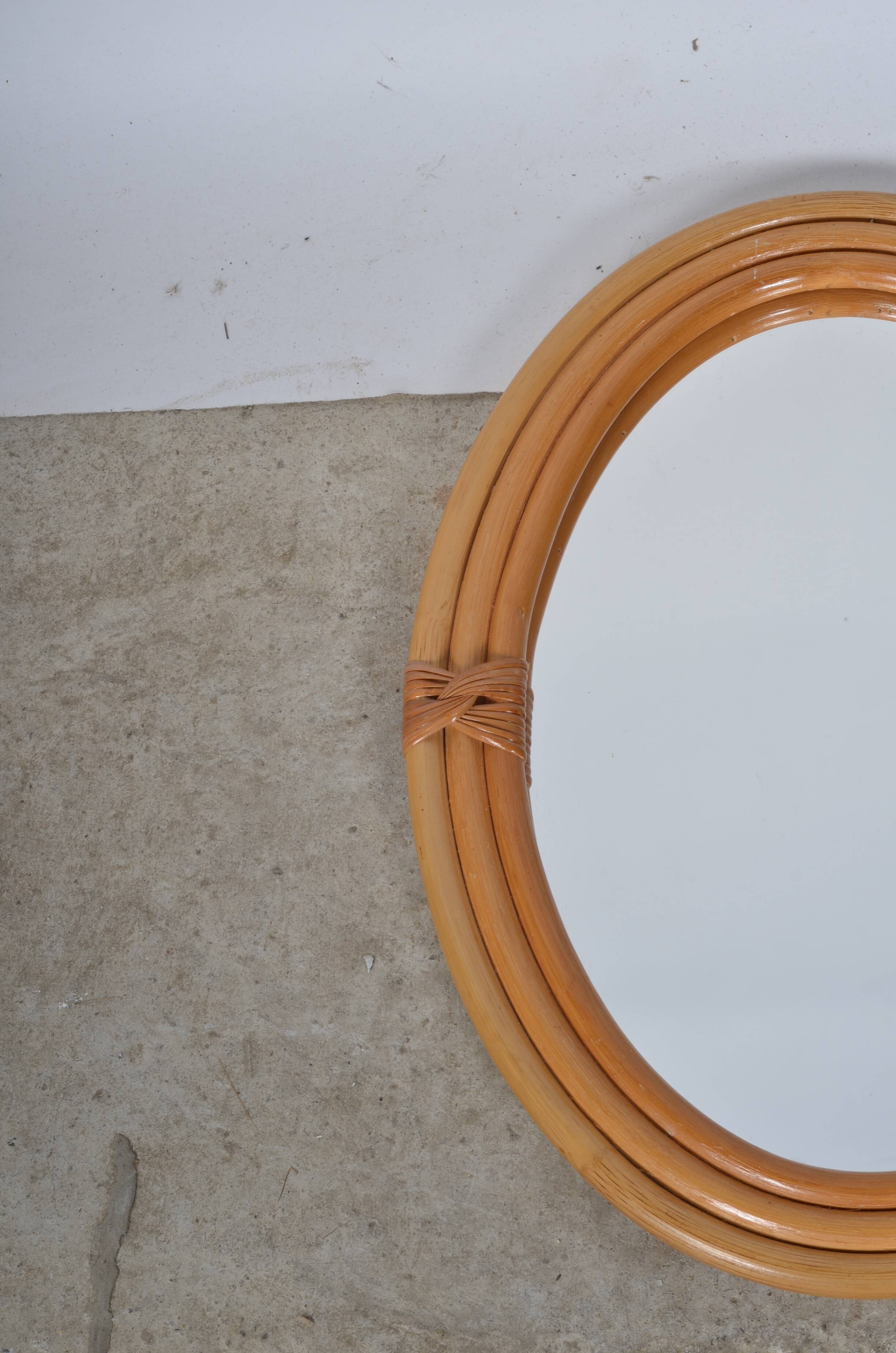 Oval rattan mirror
