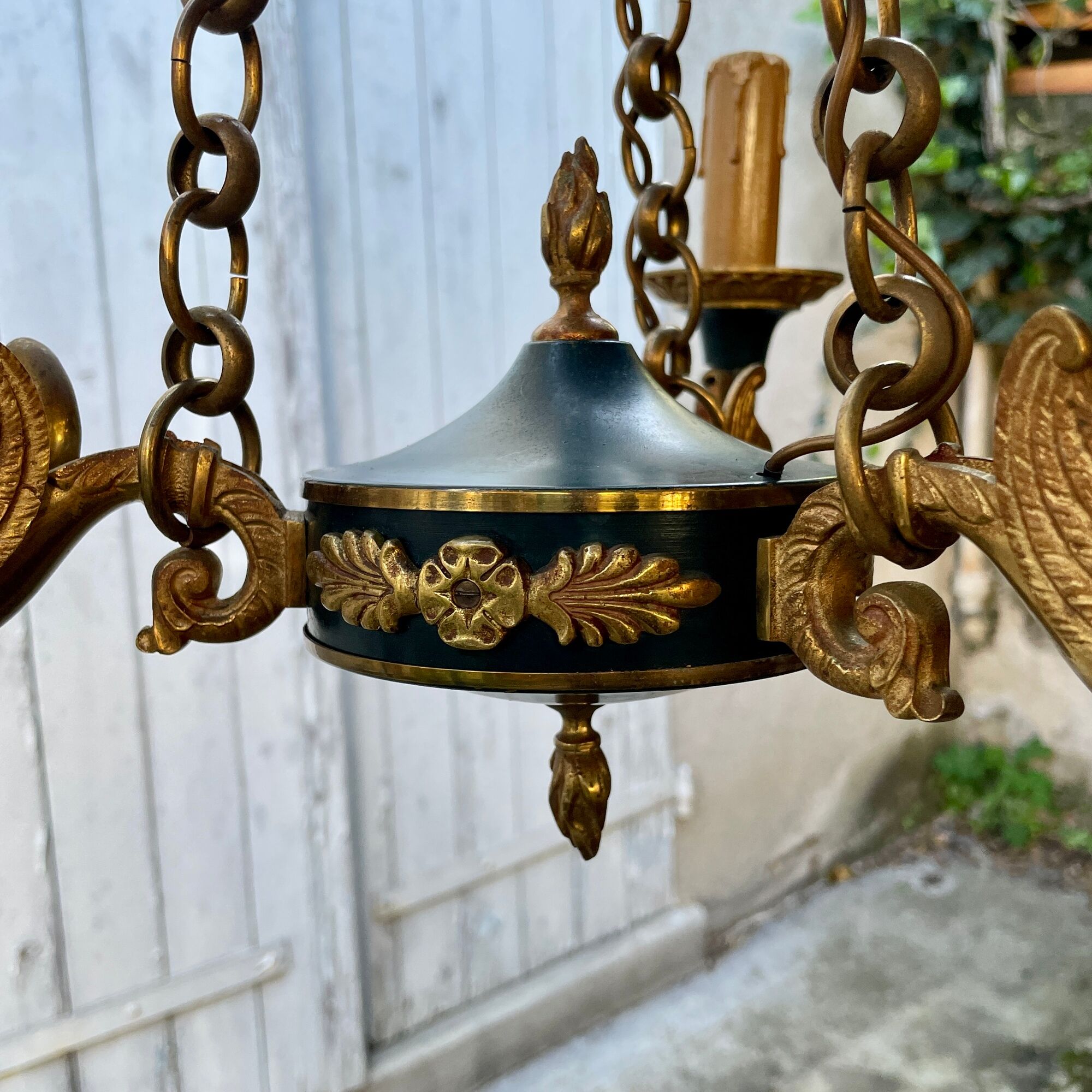 Lucien gau chandelier pendant lamp in bronze with swan decoration.