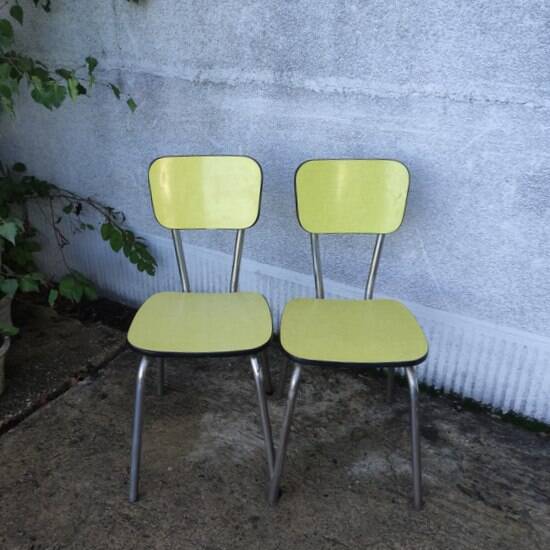 Pair of yellow formica chairs