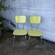 Pair of yellow formica chairs