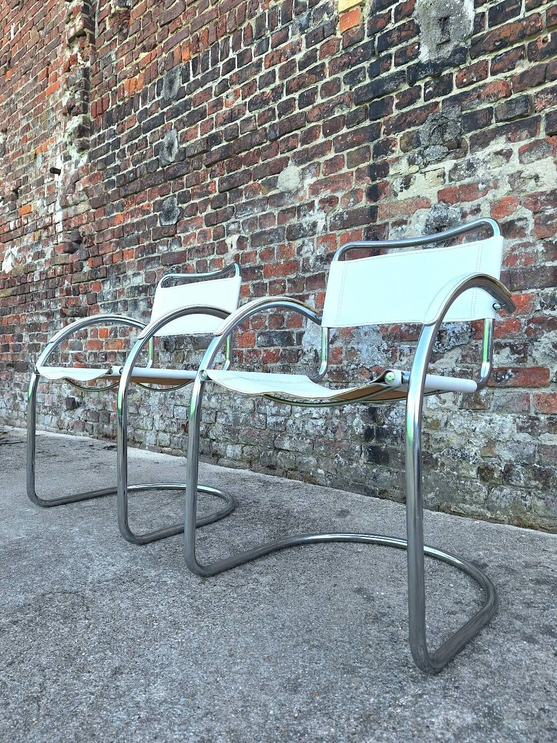 Pair of vintage tubular armchairs, designer seating furniture