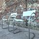 Pair of vintage tubular armchairs, designer seating furniture