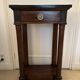 Antique small Empire console from the early 19th century in mahogany and marble.