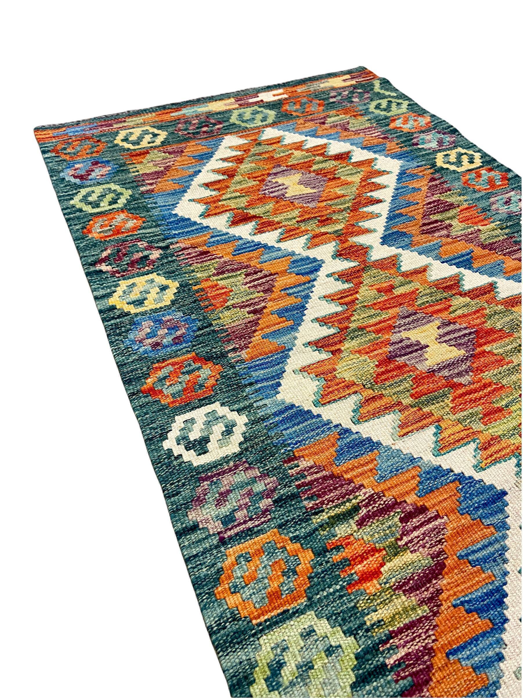 Green and orange hallway carpet