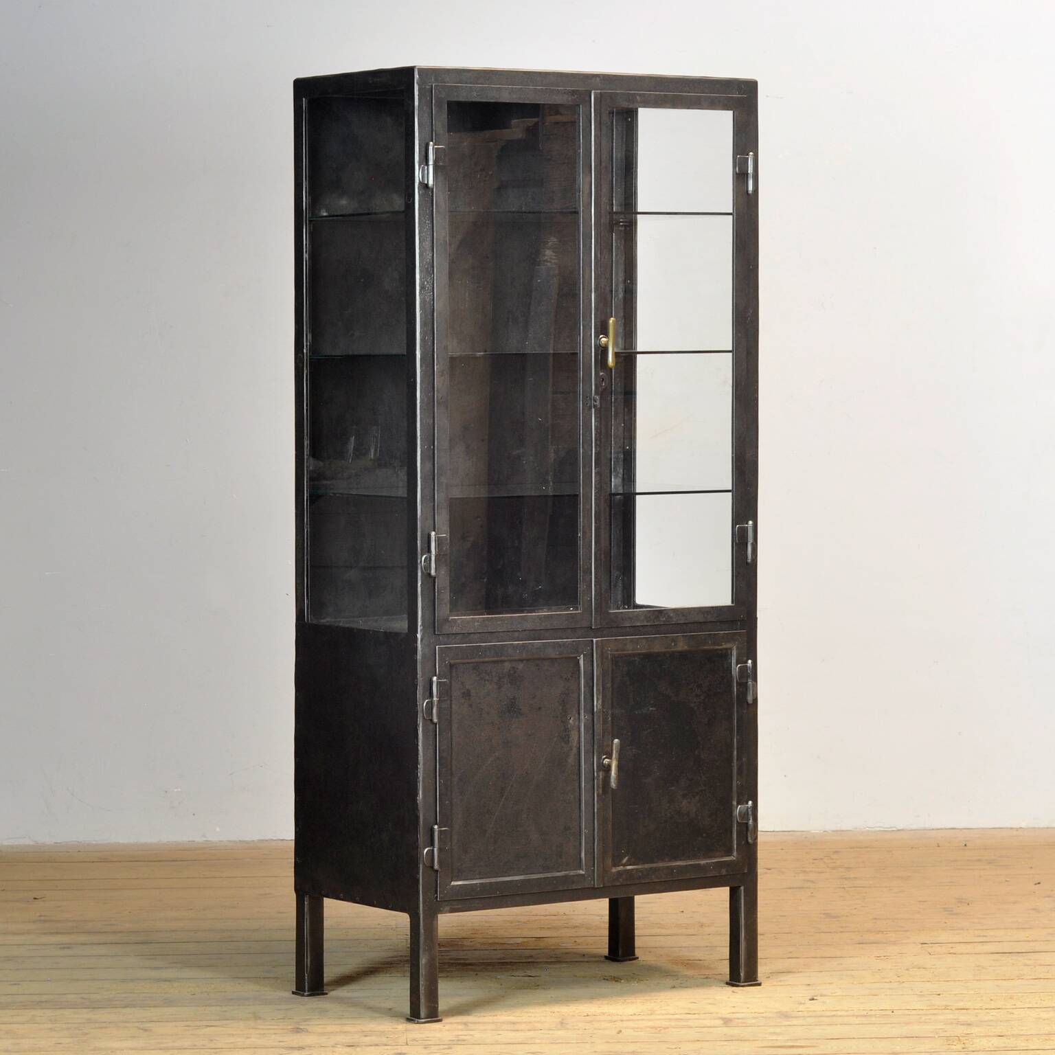 Polished iron medical cabinet, 1920s