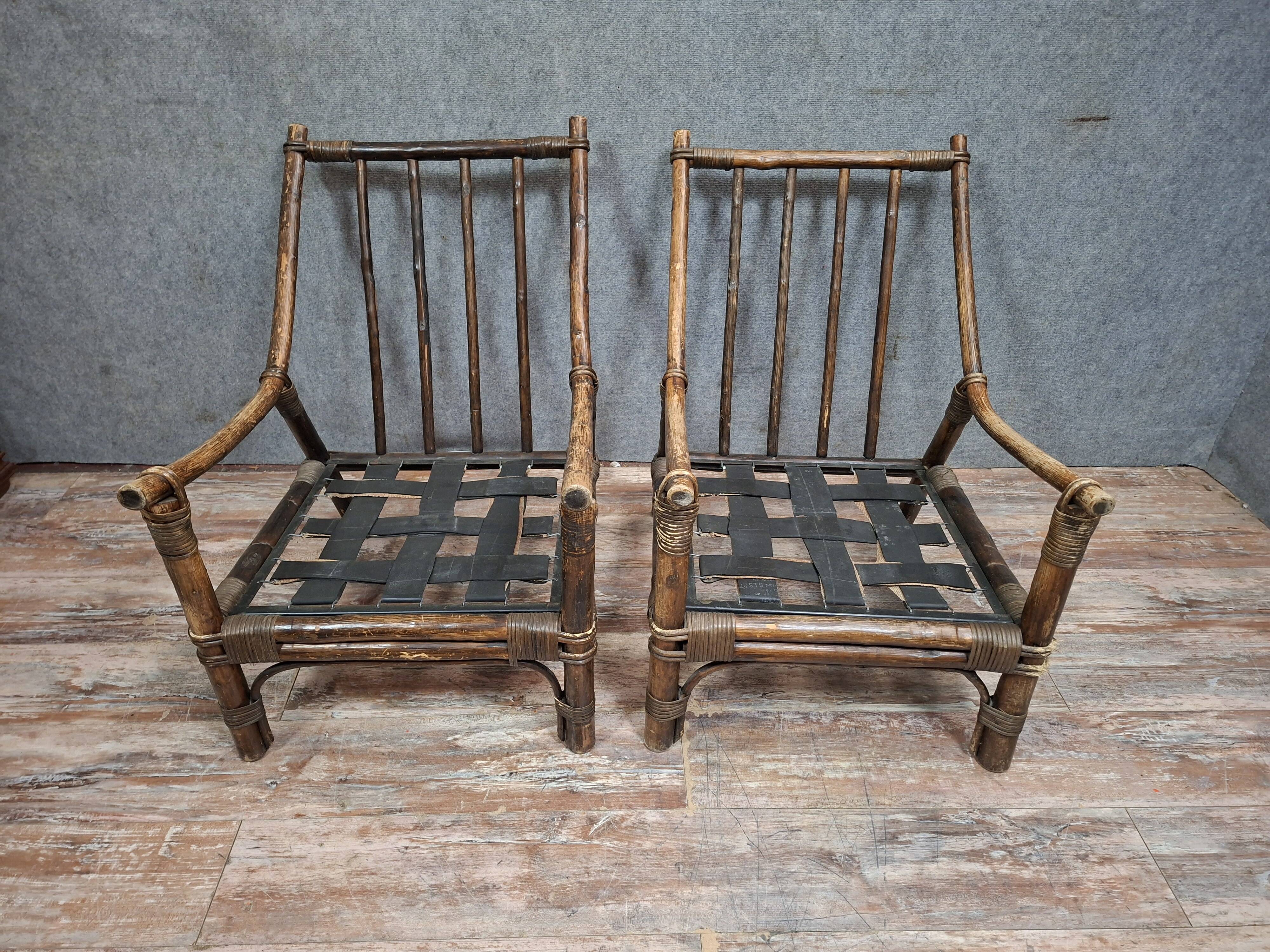 Pair of low bamboo armchairs with an exotic spirit, dating from the early 20th century.