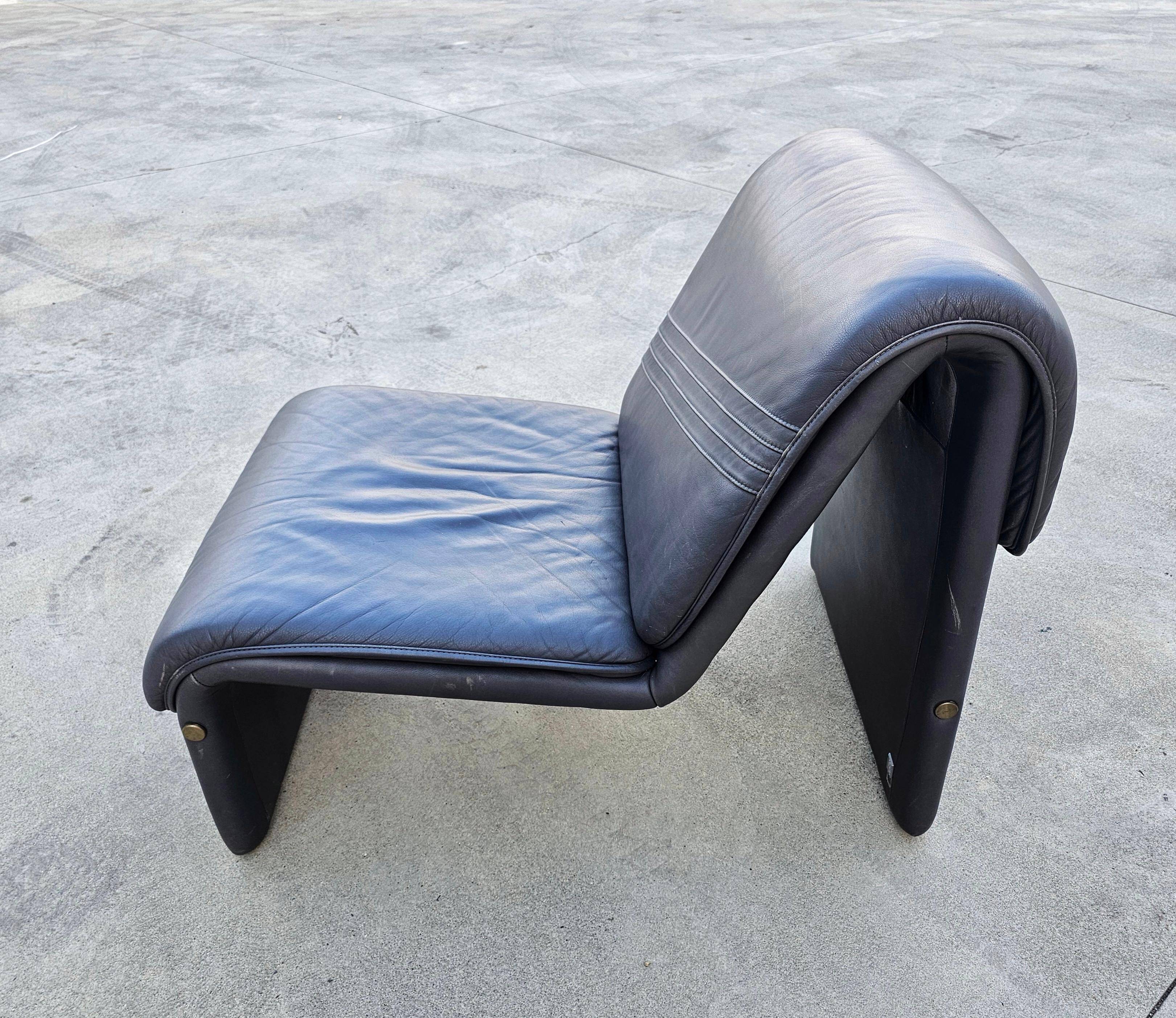 Postmodern leather lounge chairs in the style of Etienne Fermigier 1978.