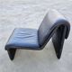Postmodern leather lounge chairs in the style of Etienne Fermigier 1978.