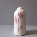 Porcelain vase and biscuit decorated with flowers
