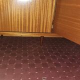 1960s teak veneer secretary with sliding display cabinet.