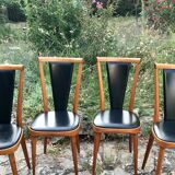 Four vintage beech and skai chairs