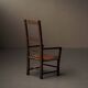 Old peasant armchair in solid wood and woven straw – Auvergne, 19th century.