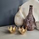 Pair of crown candle holders in brass