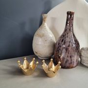 Pair of crown candle holders in brass