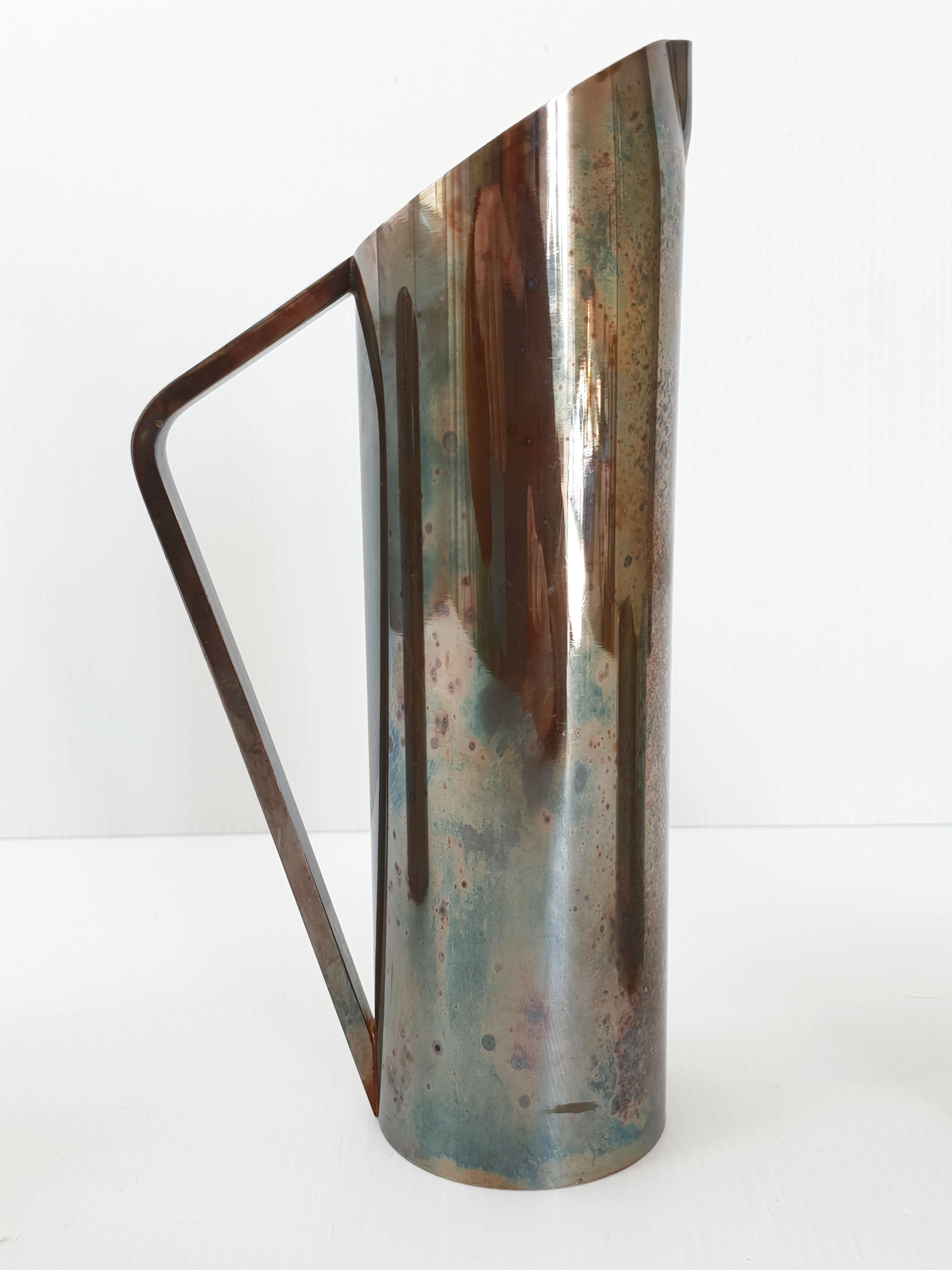 Suite of 3 pitchers in vintage 1970 silver metal