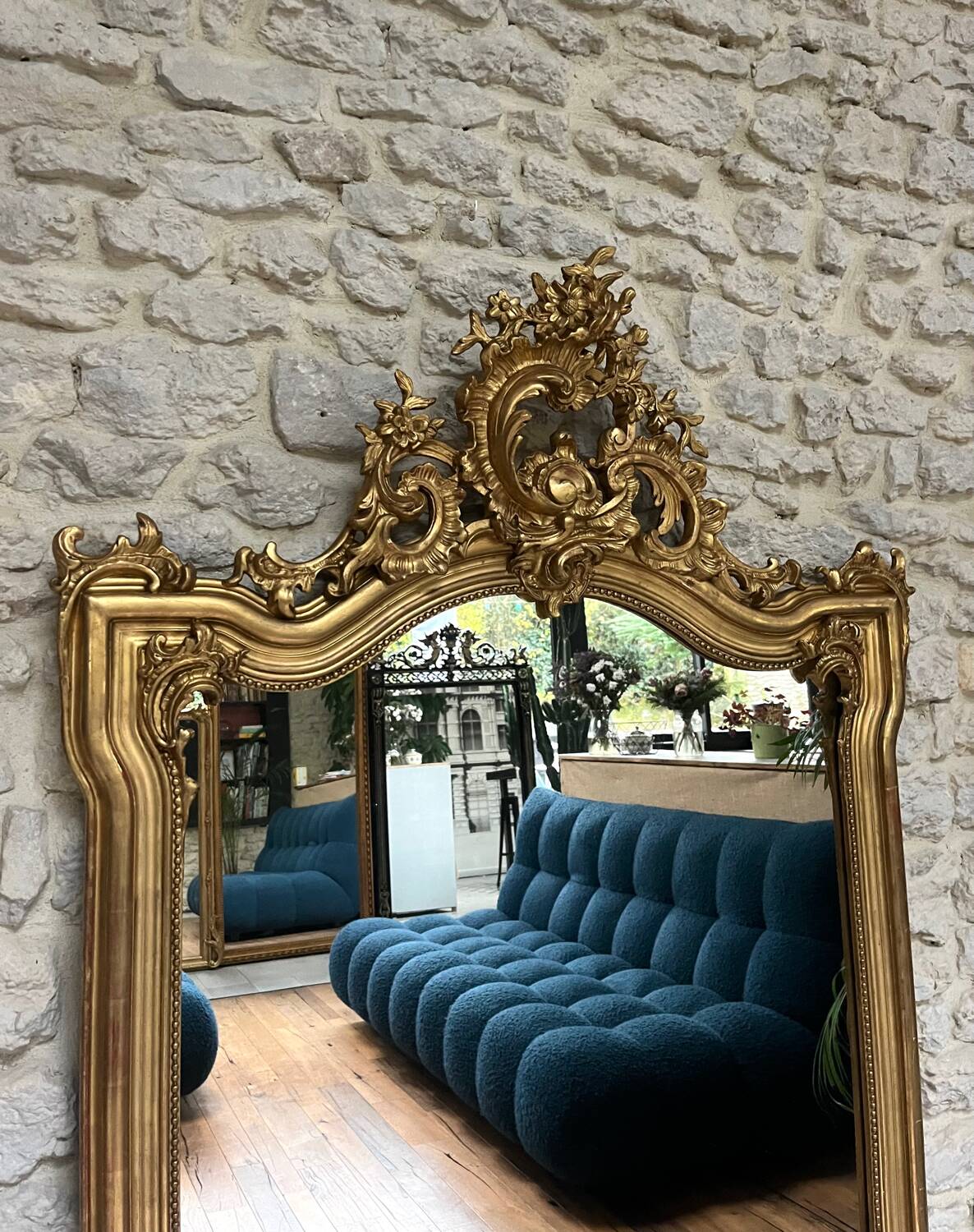 Antique mirror 169/105cm with pediments and pearl detailing in gold leaf.