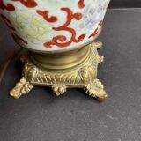 Old Asian vase mounted as a lamp with pagoda lampshade