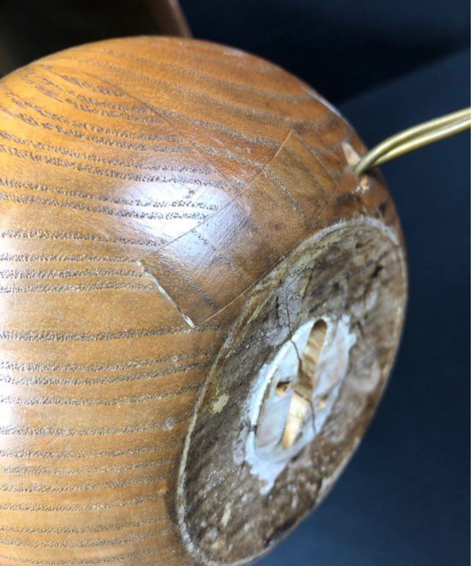Vintage modernist lamp in wood and hammered copper.