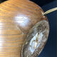 Vintage modernist lamp in wood and hammered copper.