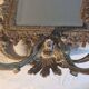 Pair of mirror sconces/candle holders in 19th-century bronze.