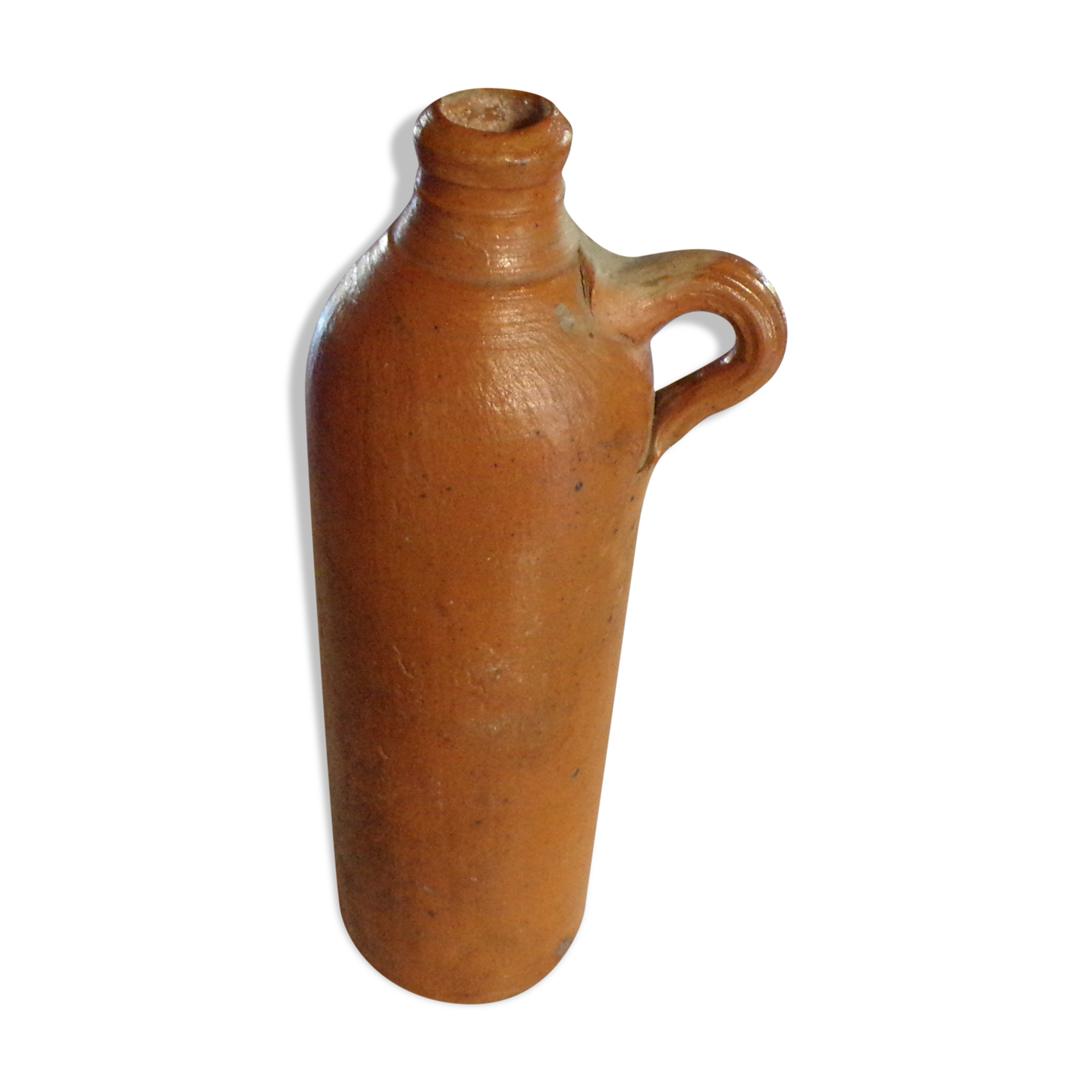 Old glazed terracotta bottle