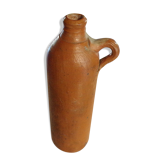 Old glazed terracotta bottle