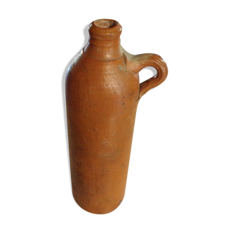 Old glazed terracotta bottle