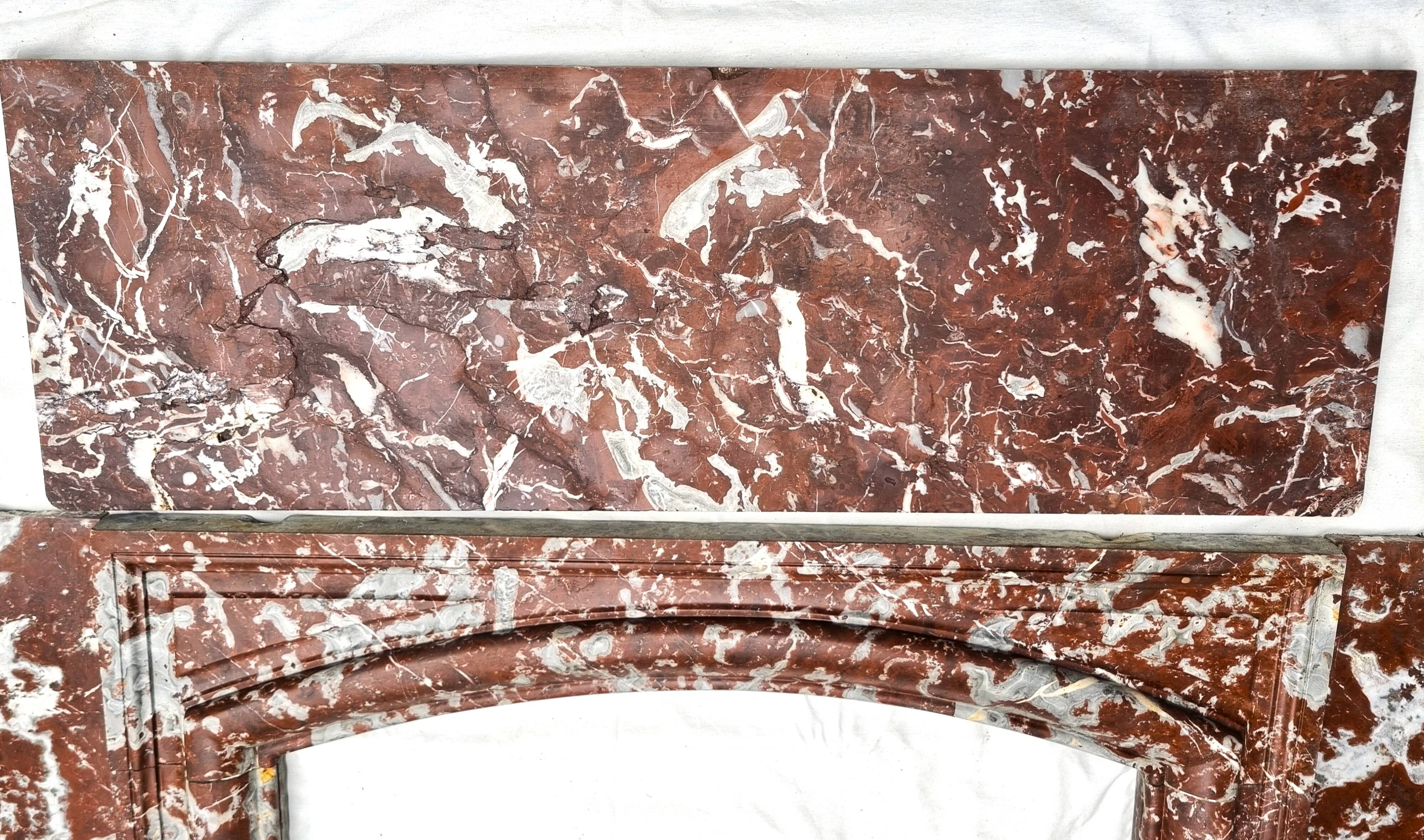 Louis XIV fireplace in Languedoc marble