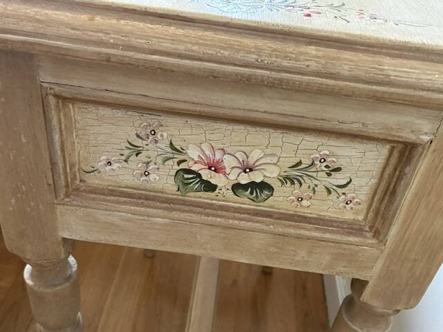 exotic wood console with a drawer