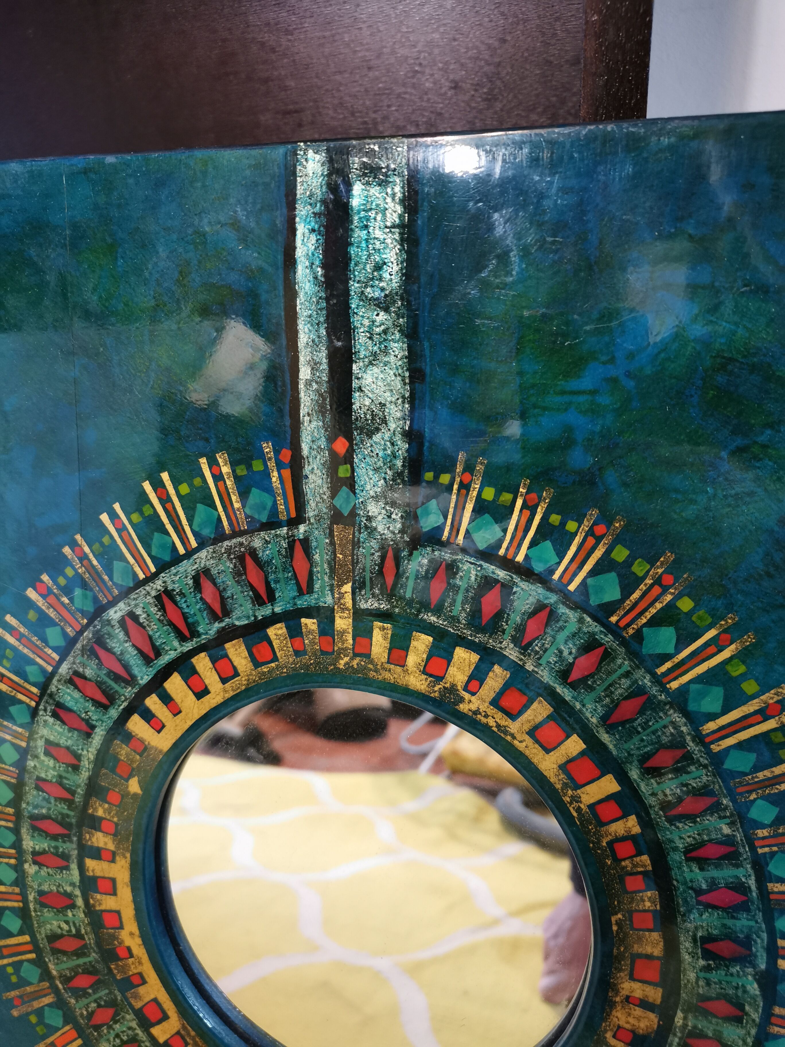 Green and gold laque mirror signed Clémence