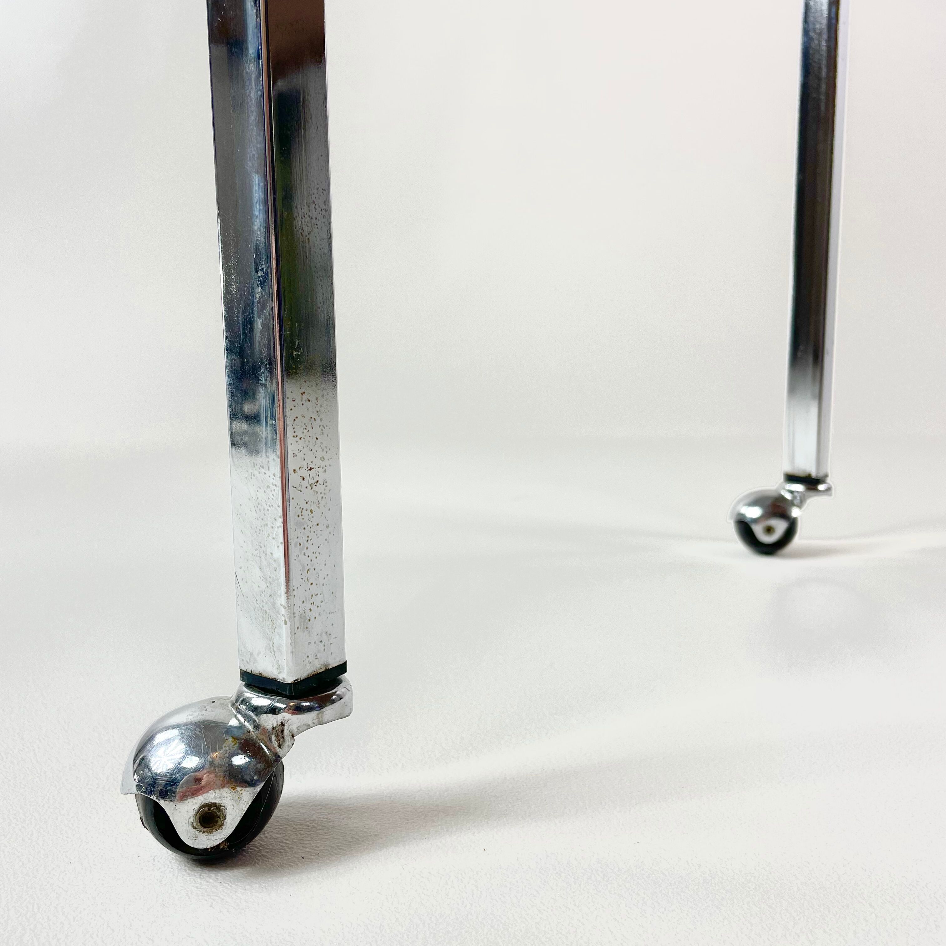 Table on wheels, laminate top and metal Eiffel legs, circa 1950