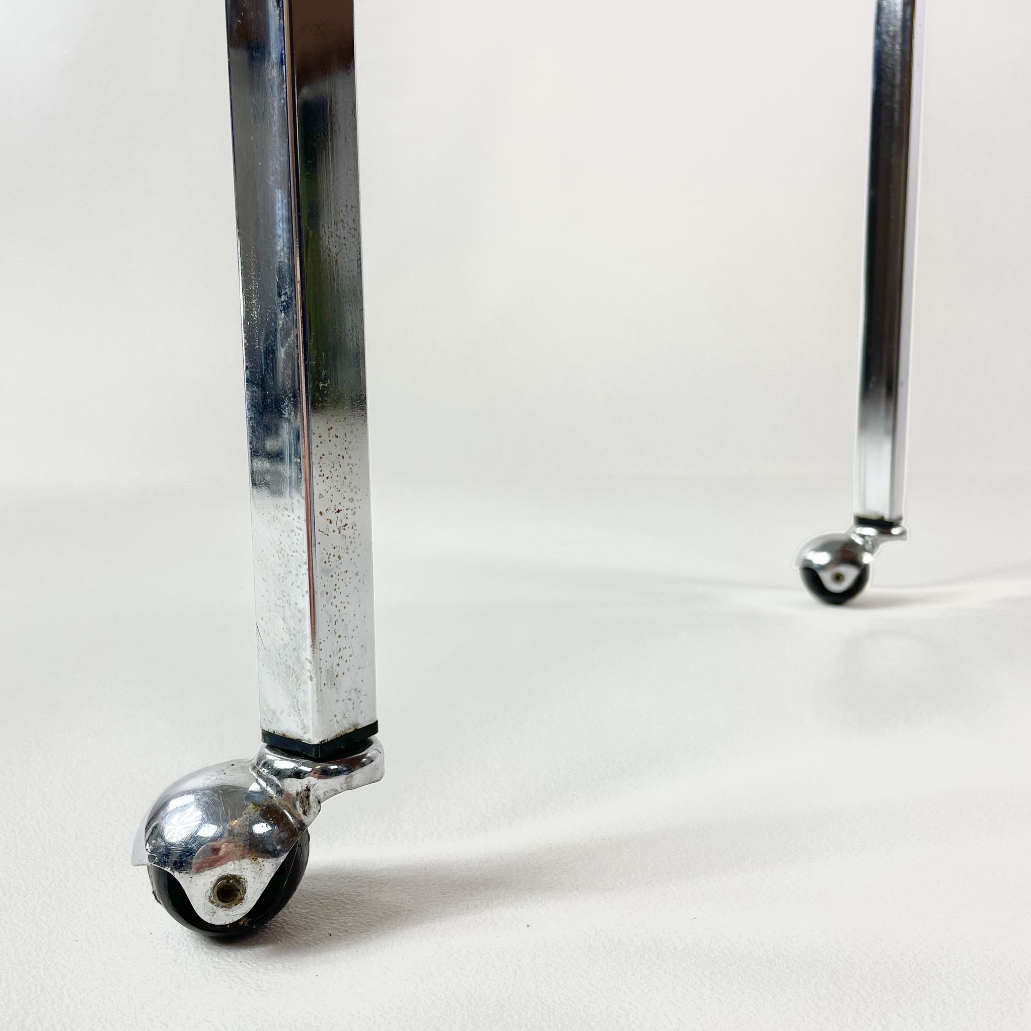 Table on wheels, laminate top and metal Eiffel legs, circa 1950